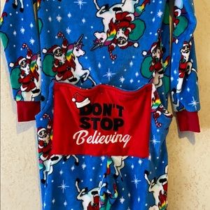 Fleece Santa on a unicorn pajamas